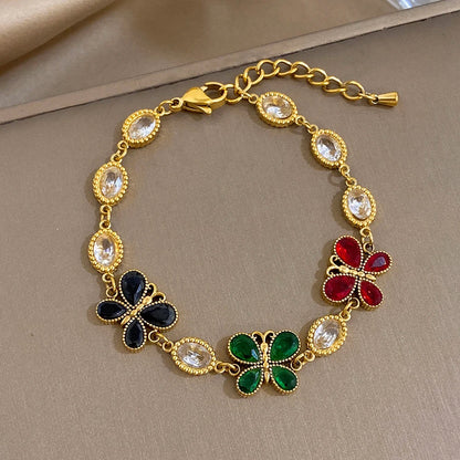Pulseira Feminina Dourada Borboleta com Zircônia — Vista Frontal | Lojas LA