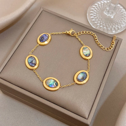 Pulseira Dourada Feminina Abalone — Detalhe da Pedra Iridescente | Lojas LA