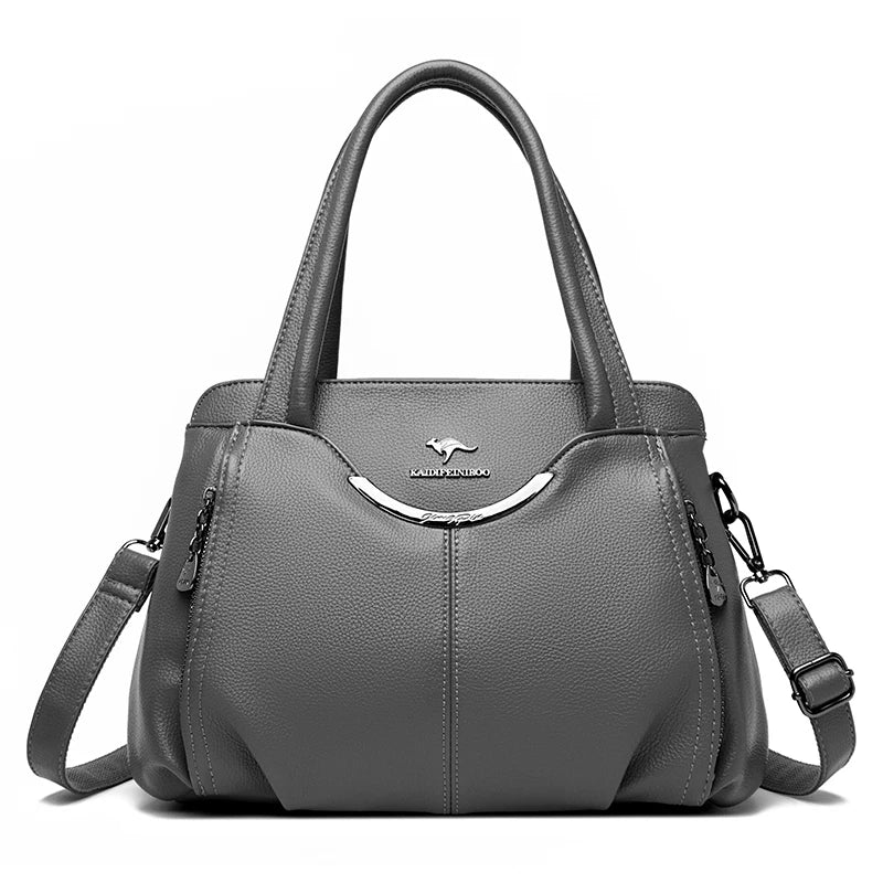 Bolsa feminina designer multipockets vista lateral couro macio