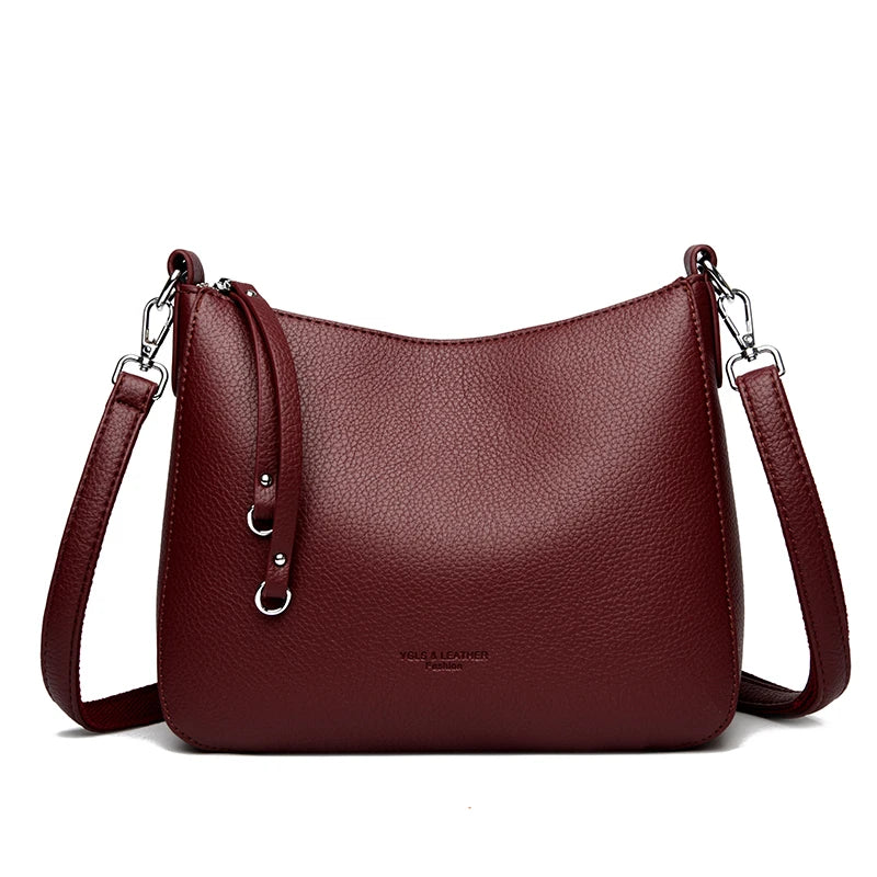Detalhe do fecho zíper dourado — bolsa feminina premium couro PU
