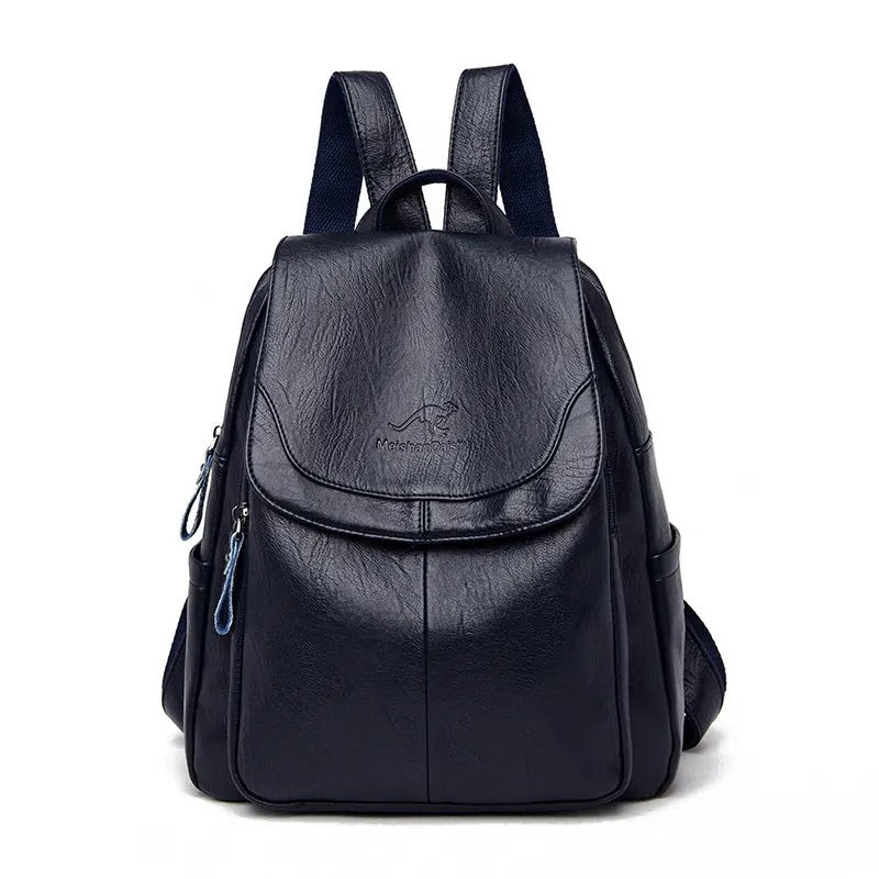 Mochila feminina vintage couro — vista lateral fivelas metálicas