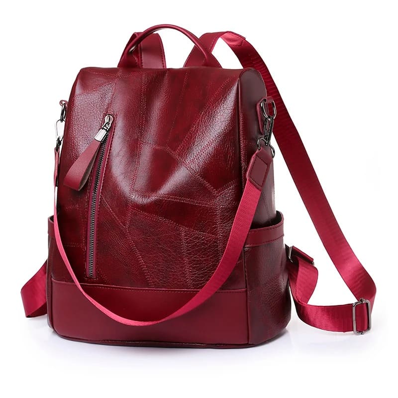 Mochila feminina couro macia — vista lateral design minimalista