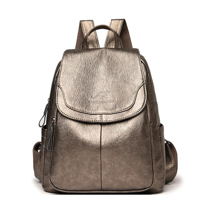 Mochila feminina vintage couro preta — look casual
