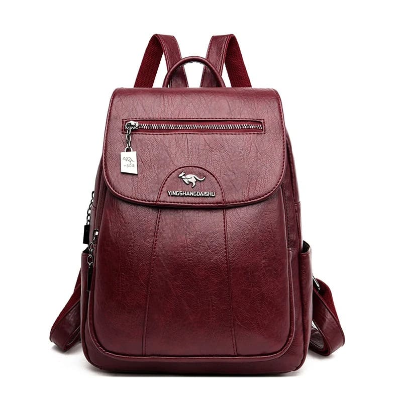 Mochila feminina couro grande capacidade — vista lateral elegante