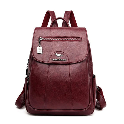 Mochila feminina couro grande capacidade — vista lateral elegante